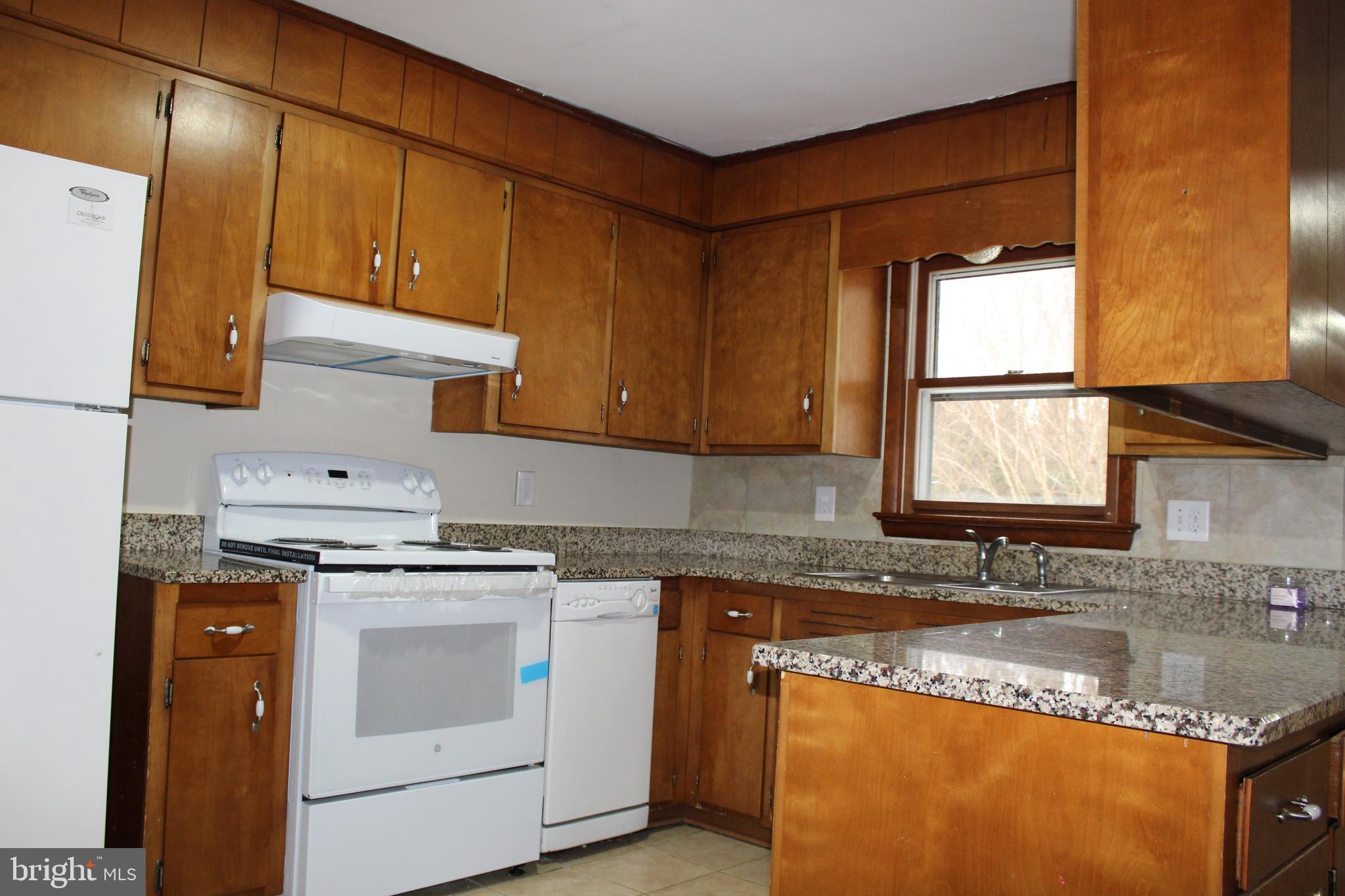 6604 Old Shawnee Road Milford, DE 19963 - Photo 10 of 29 Kitchen with new Range and Range Hood