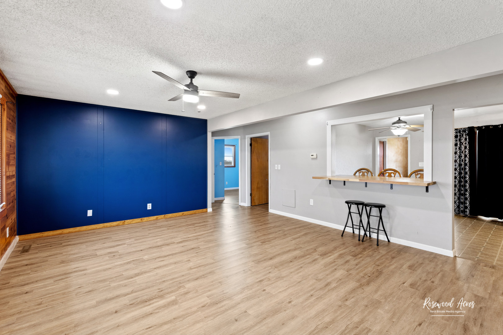 19663 North 3000 E Road Cullom, IL 60929 - Photo 3 of 18 a view of an empty room with a window and wooden floor