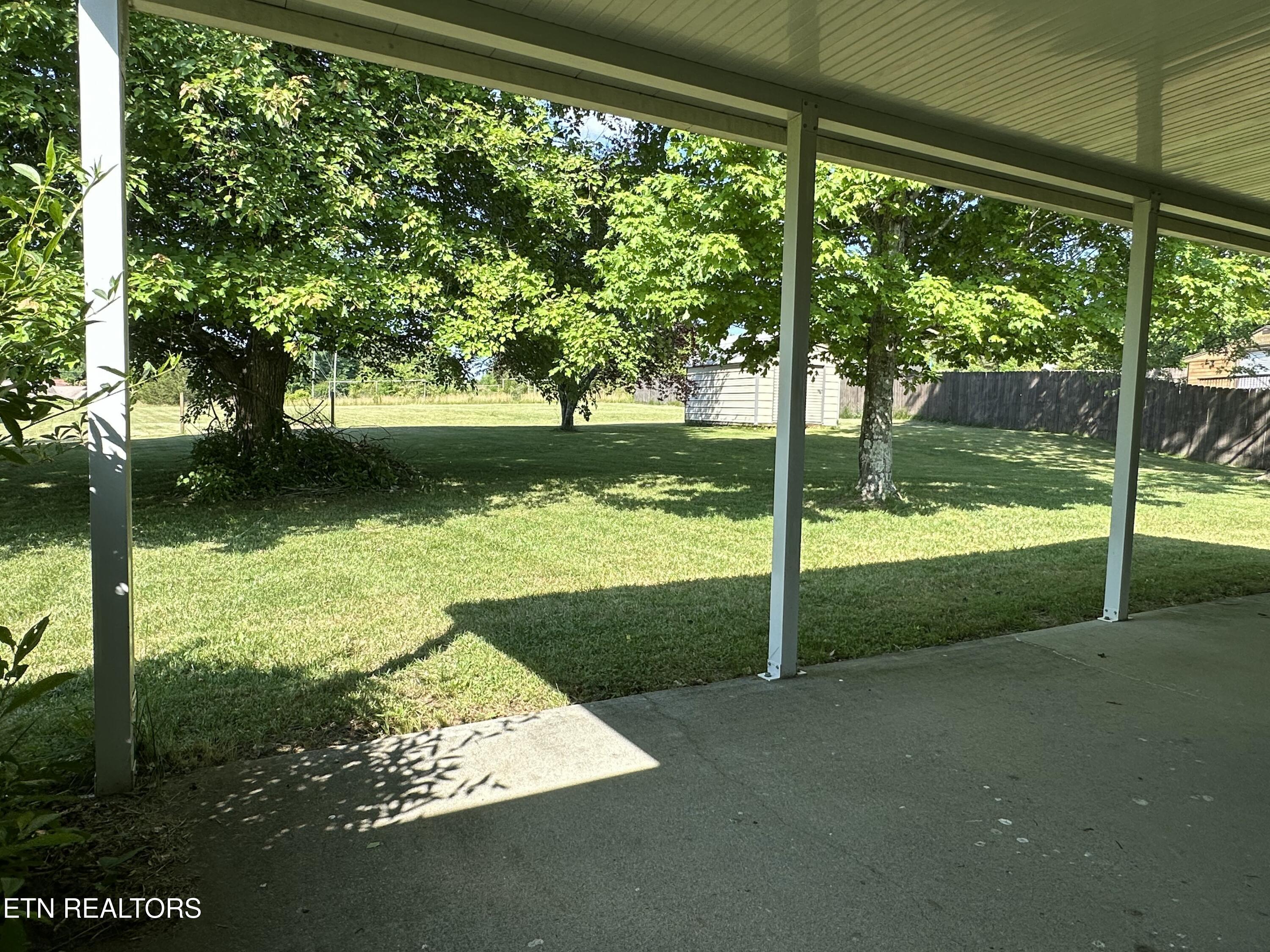 7021 Pisa Circle Corryton, TN 37721 - Photo 24 of 32 Porch to Backyard 02