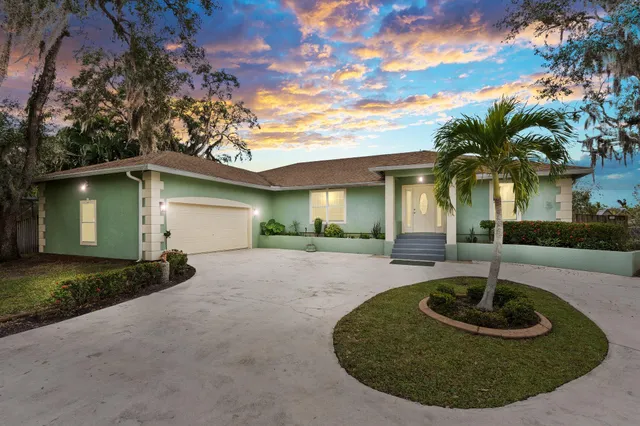 a view of a house with entertaining space