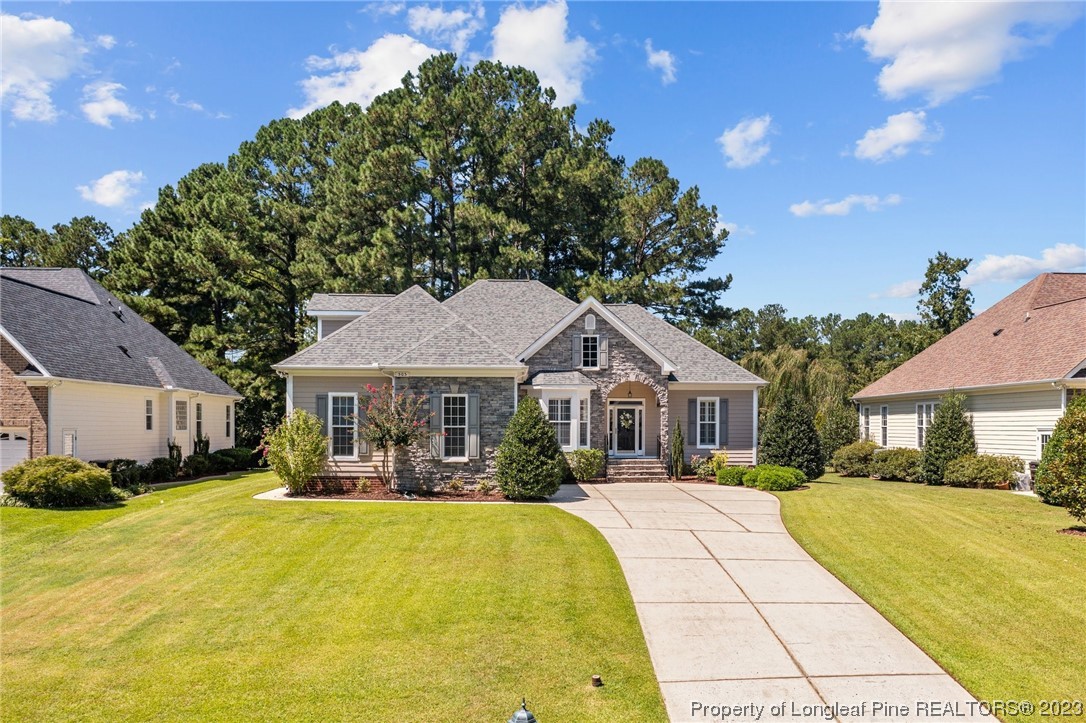 505 Falling Water Road Spring Lake, NC 28390 - Photo 1 of 40 a front view of a house with a yard