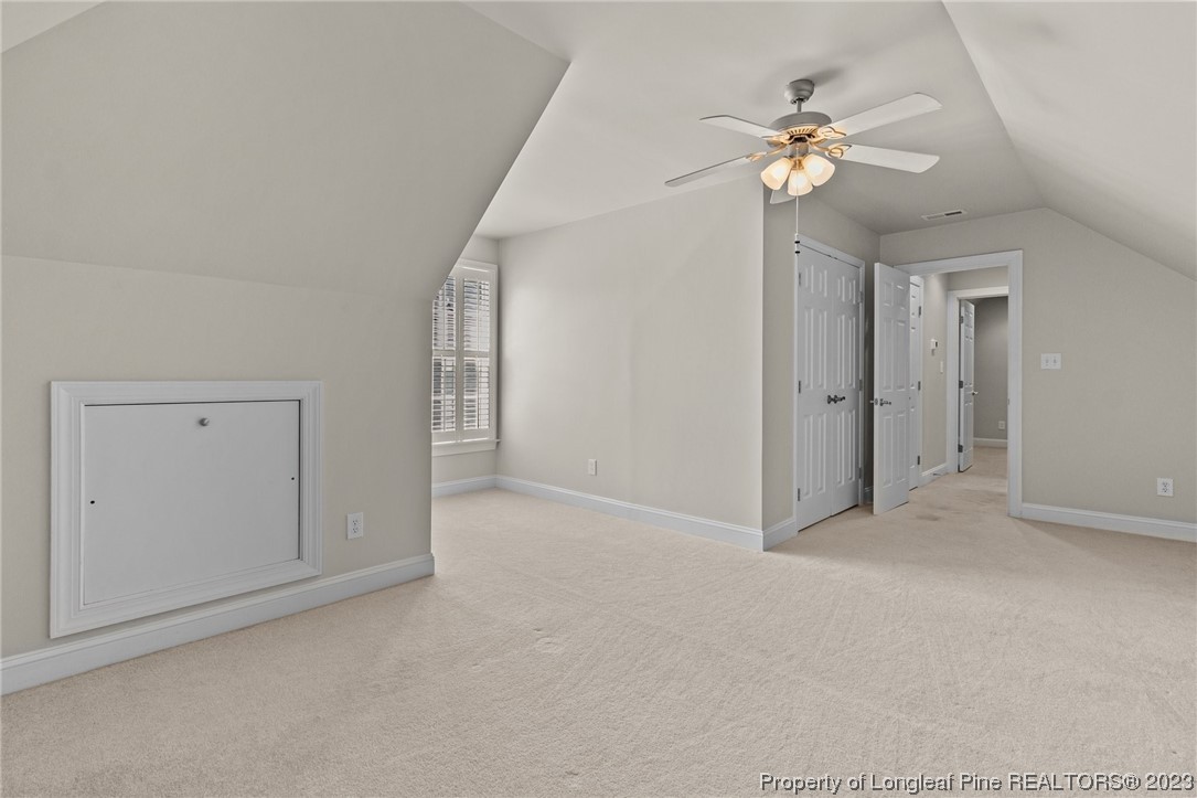 505 Falling Water Road Spring Lake, NC 28390 - Photo 31 of 40 a view of an empty room with a chandelier fan