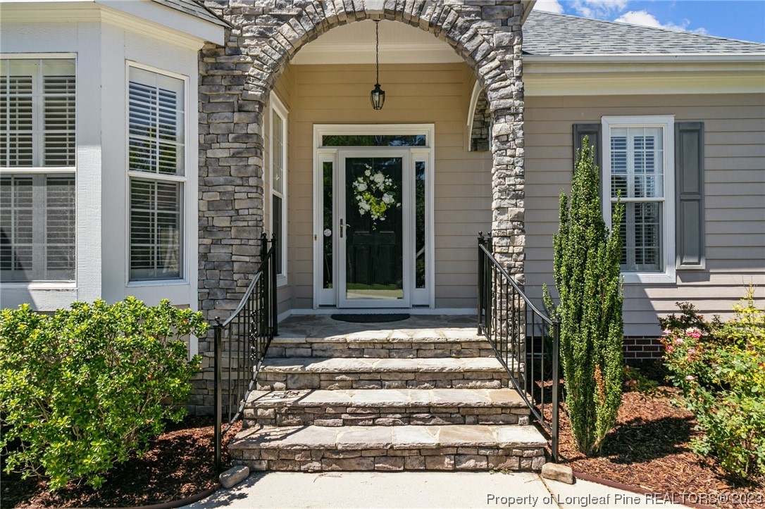 505 Falling Water Road Spring Lake, NC 28390 - Photo 6 of 40 a front view of a house with a garden