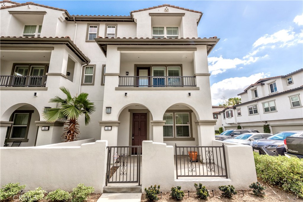 11 Travis Road Buena Park, CA 90621 - Photo 1 of 1 a front view of a house with a garden