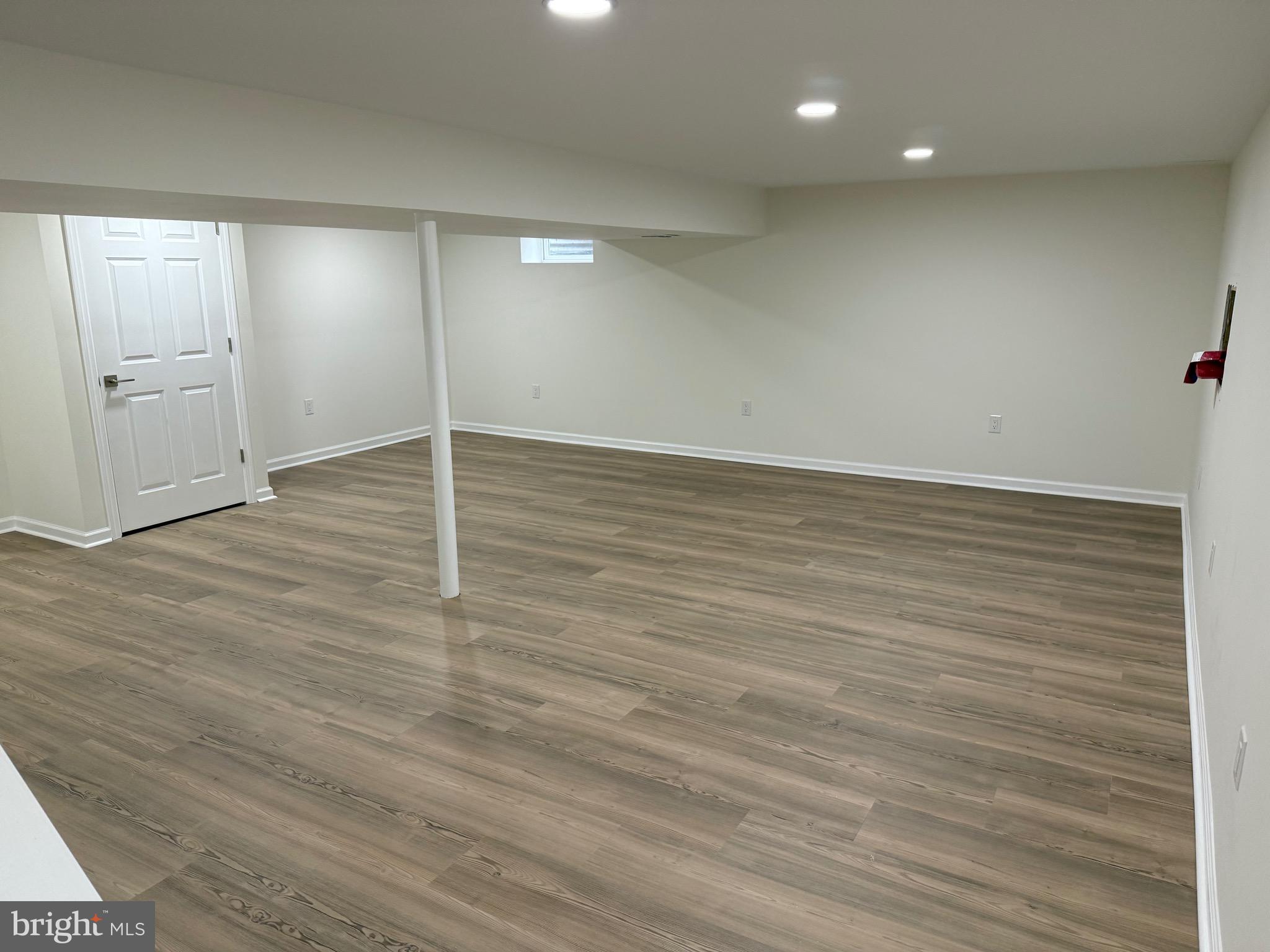 806 Lightfoot Drive Lancaster, PA 17602 - Photo 14 of 21 a view of an empty room with wooden floor