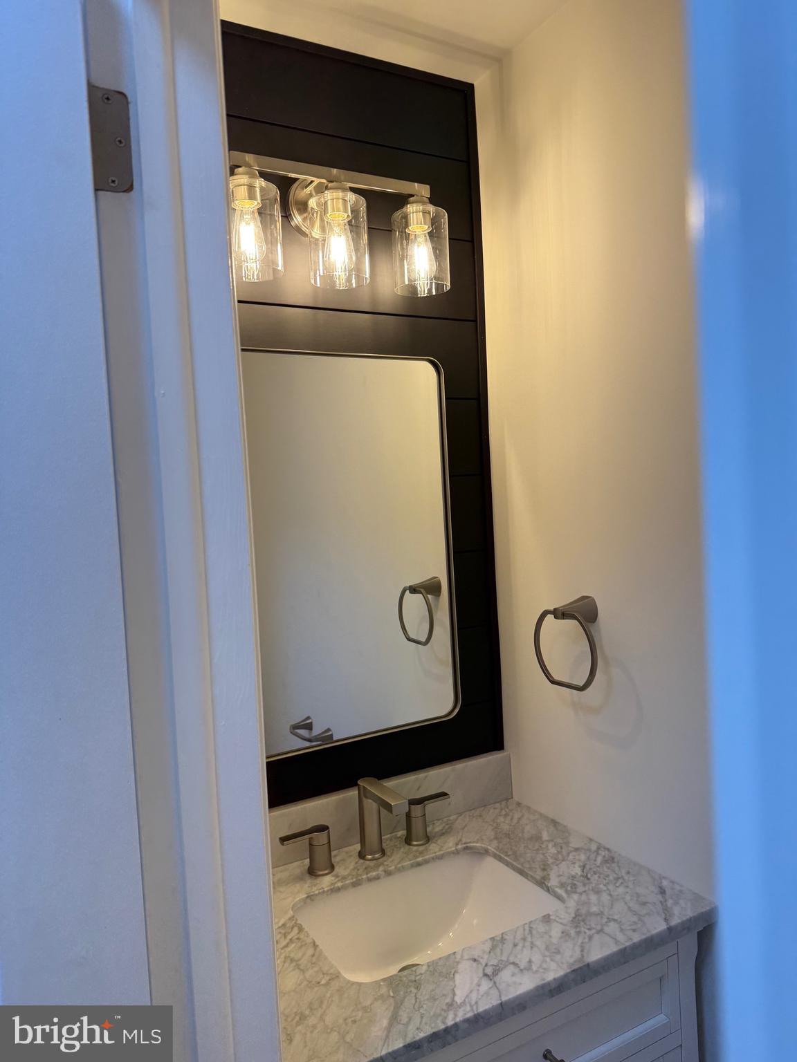 806 Lightfoot Drive Lancaster, PA 17602 - Photo 15 of 21 a bathroom with a granite countertop sink and a mirror