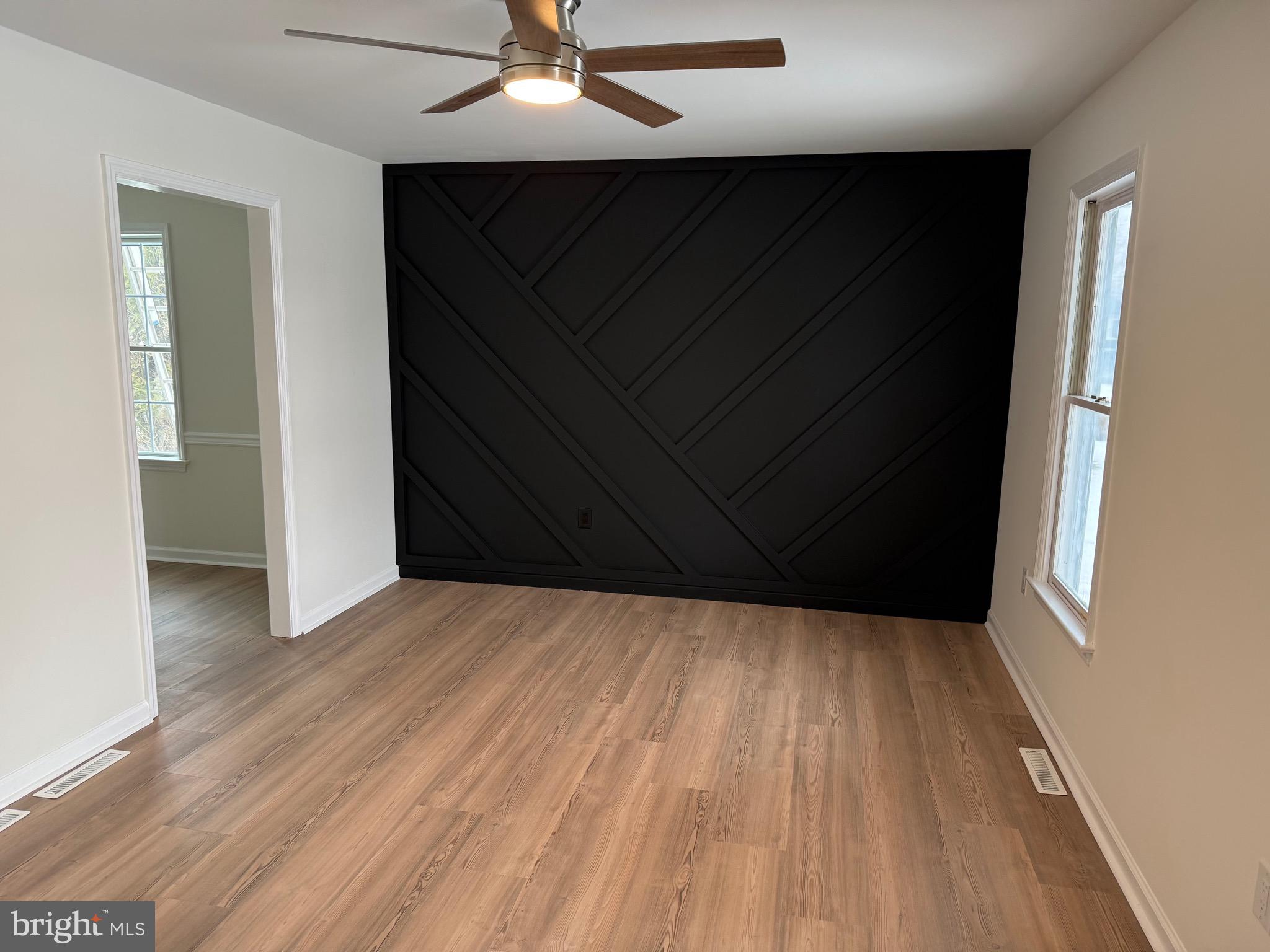 806 Lightfoot Drive Lancaster, PA 17602 - Photo 21 of 21 an empty room with wooden floor and fan