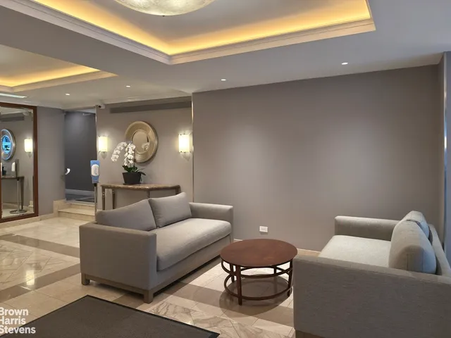 a view of a balcony with chairs