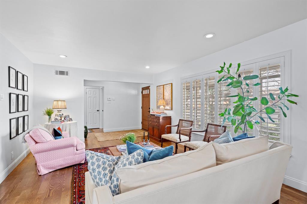 5322 Ridgelawn Drive Dallas, TX 75214 - Photo 16 of 30 a living room with furniture and a potted plant