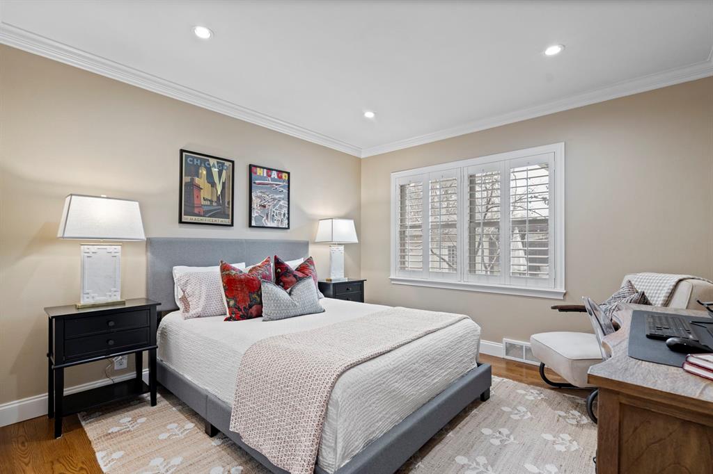 5322 Ridgelawn Drive Dallas, TX 75214 - Photo 19 of 30 a bedroom with bed and window