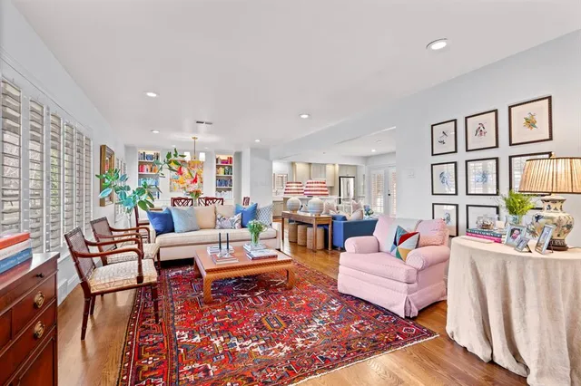 a living room with furniture or couch and a bookshelf