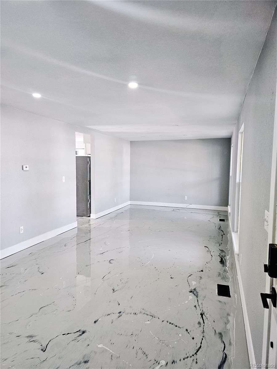 4716 Freeport Way Denver, CO 80239 - Photo 4 of 29 a view of an empty room