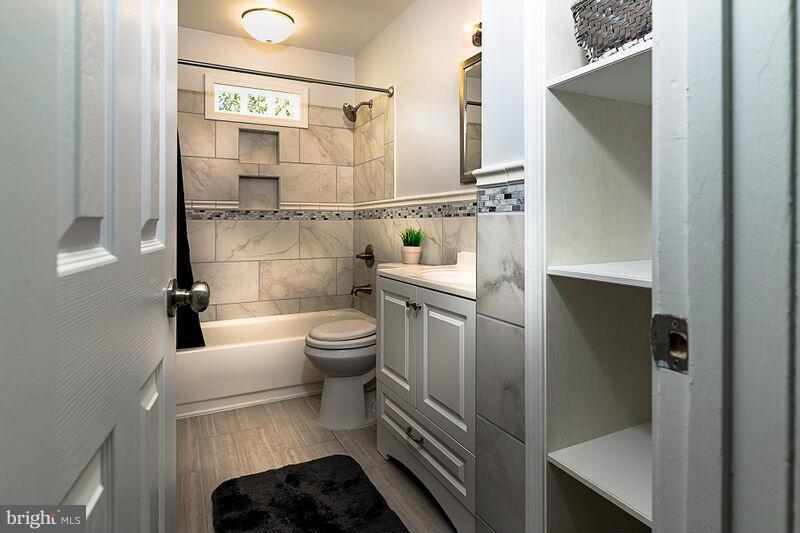 4220 Granby Road Woodbridge, VA 22193 - Photo 14 of 30 a bathroom with a toilet and a shower