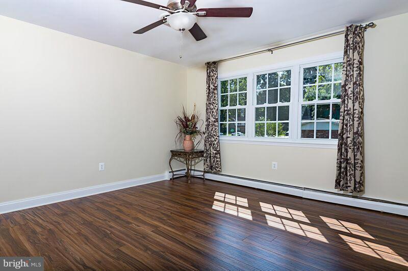 4220 Granby Road Woodbridge, VA 22193 - Photo 10 of 30 a view of an empty room with wooden floor and a window