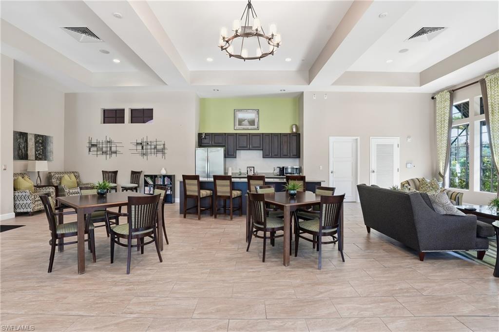 4609 Abaca Circle Naples, FL 34119 - Photo 42 of 49 a view of a dining room with furniture