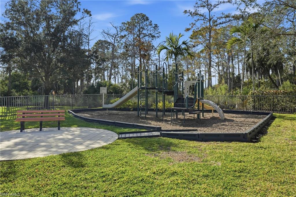 4609 Abaca Circle Naples, FL 34119 - Photo 48 of 49 a view of a park with large trees