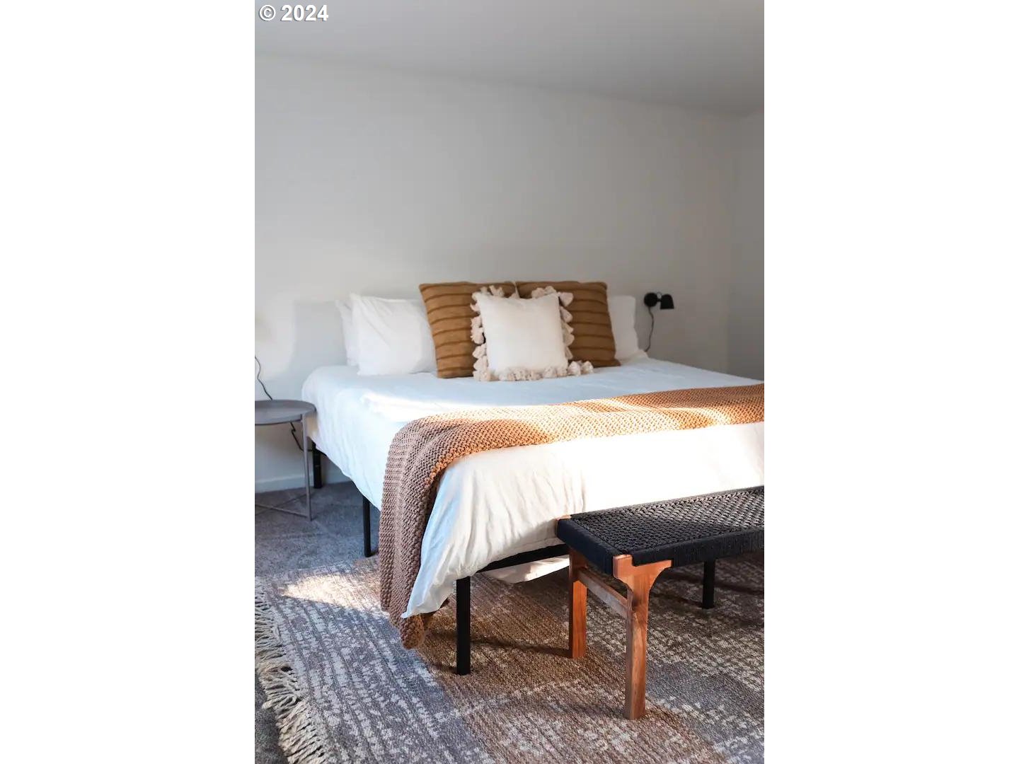 4840 Herrin Road Northeast Salem, OR 97305 - Photo 16 of 23 a bedroom with a bed and mirror