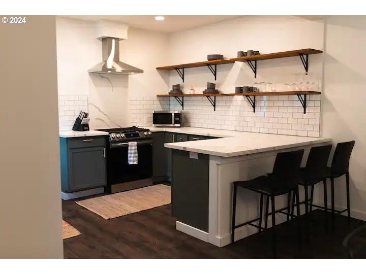 4840 Herrin Road Northeast Salem, OR 97305 - Photo 2 of 23 a kitchen with a sink cabinets and appliances