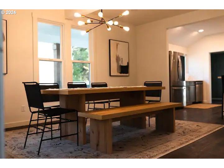 4840 Herrin Road Northeast Salem, OR 97305 - Photo 4 of 23 a view of a dining room with furniture and a window
