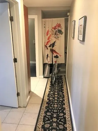 a bathroom with a vanity and a shower
