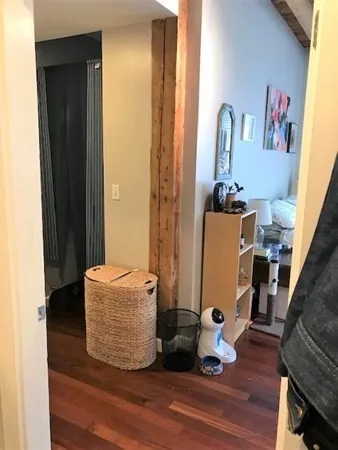 a room with toys and wooden floor