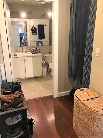 a room with a sink and a mirror