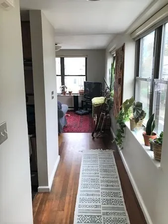 a view of a living room and a window