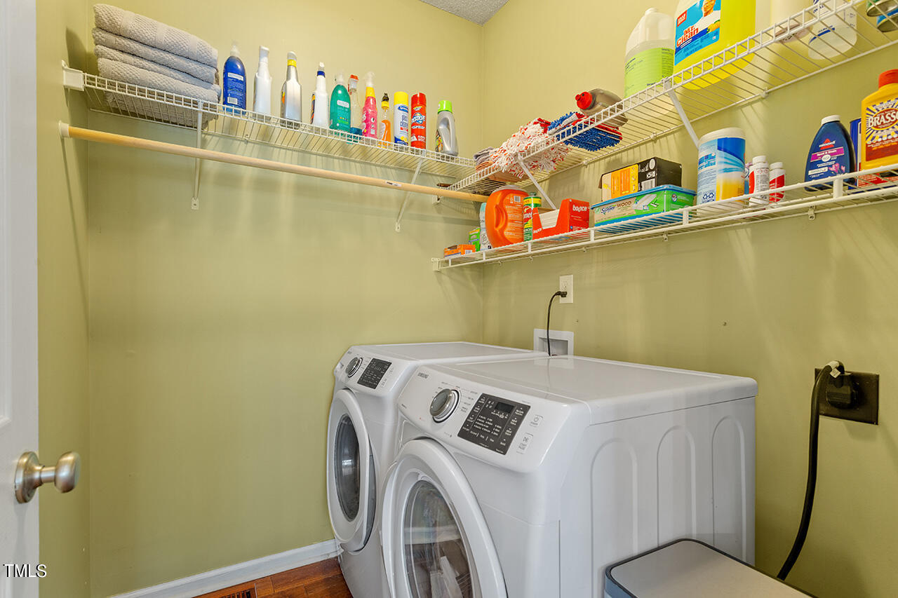 689 Seastone Street Raleigh, NC 27603 - Photo 11 of 34 a utility room with dryer and washer