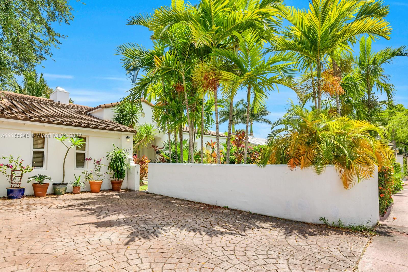 5429 Alton Road Miami Beach, FL 33140 - Photo 19 of 20 a view of a house with a plant