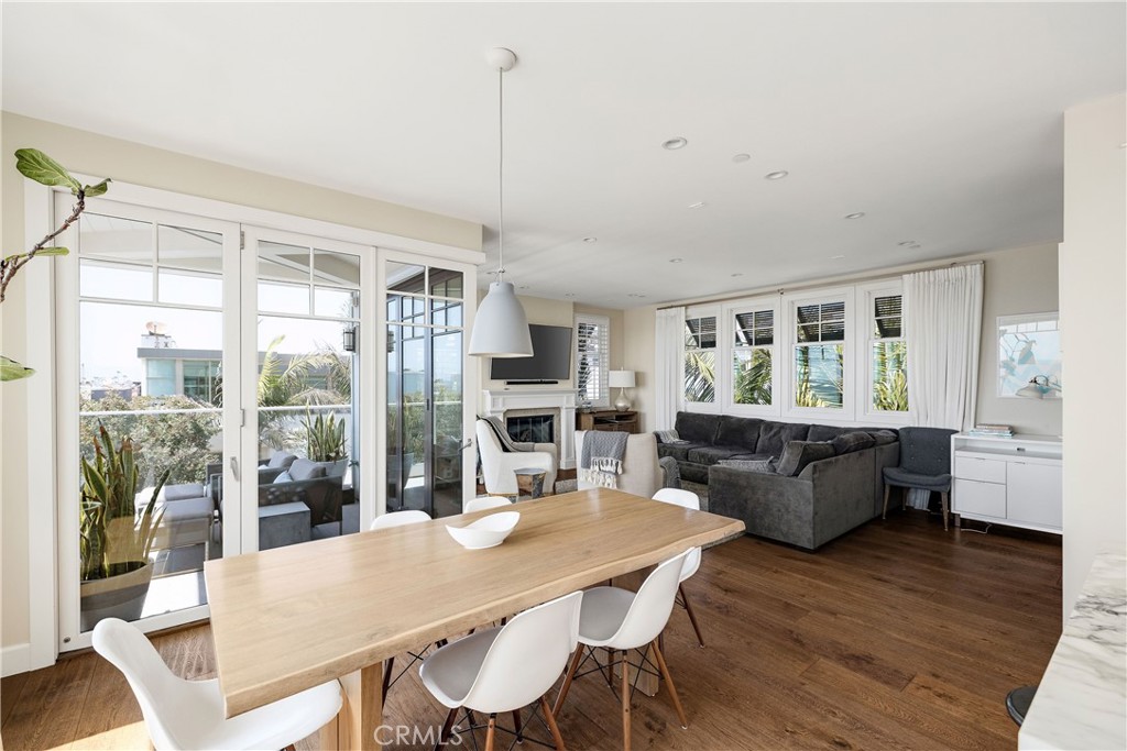 124 23rd Street Manhattan Beach, CA 90266 - Photo 28 of 50 a view of a dining room with furniture window and wooden floor