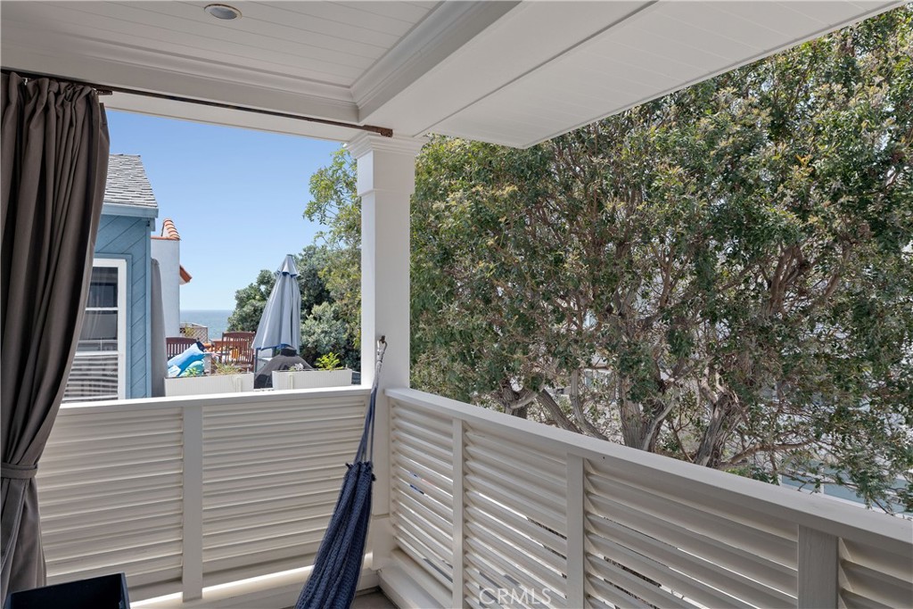 124 23rd Street Manhattan Beach, CA 90266 - Photo 39 of 50 a view of a balcony with floor to ceiling window with wooden floor