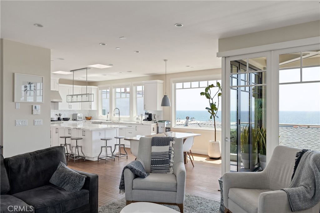 124 23rd Street Manhattan Beach, CA 90266 - Photo 10 of 50 a living room with furniture and a large window