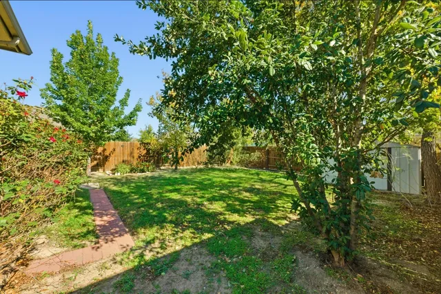 a spacious bathroom with a tub and shower