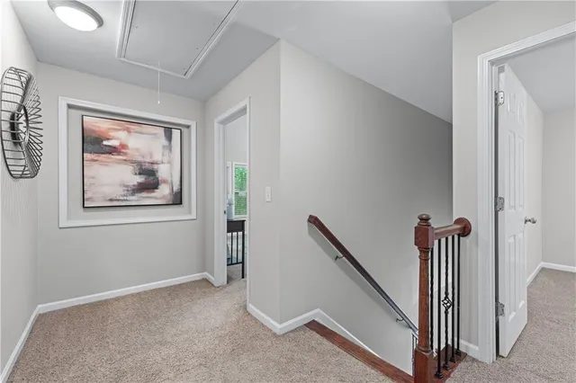 a bathroom with a double vanity sink a mirror and a shower
