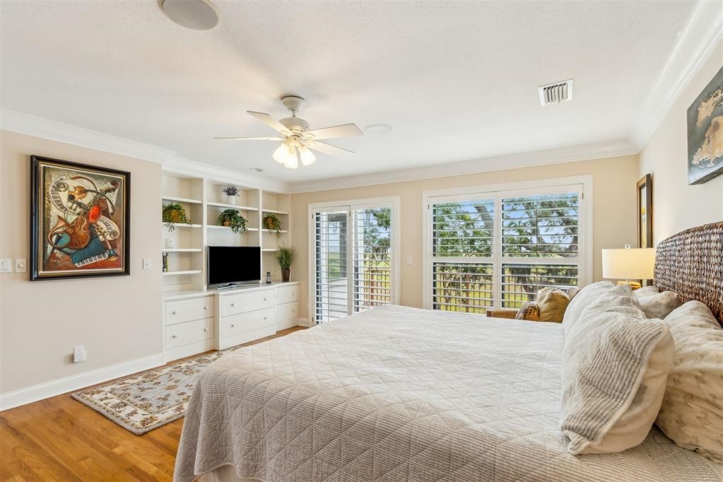 3119 Sea Marsh Road Fernandina Beach, FL 32034 - Photo 25 of 41 a bedroom with a large bed and a window