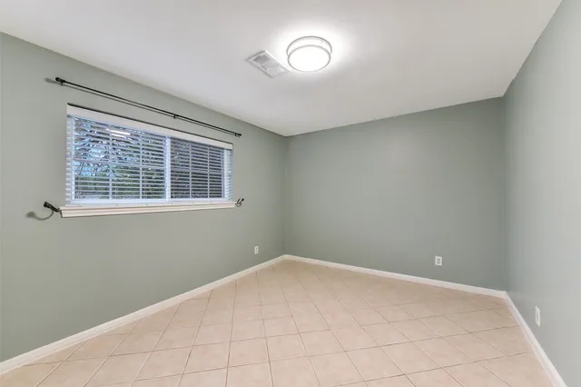 a view of a room with windows