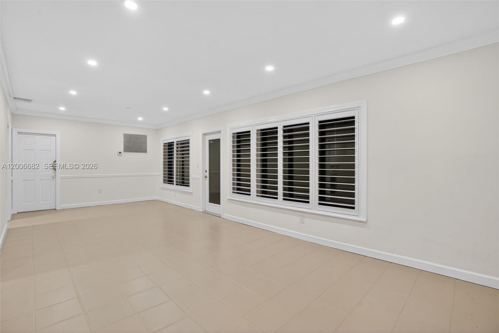 1435 Blue Road Coral Gables, FL 33146 - Photo 8 of 31 a view of an empty room with a window