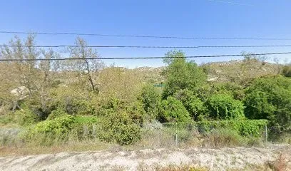 a view of a swimming pool and a yard
