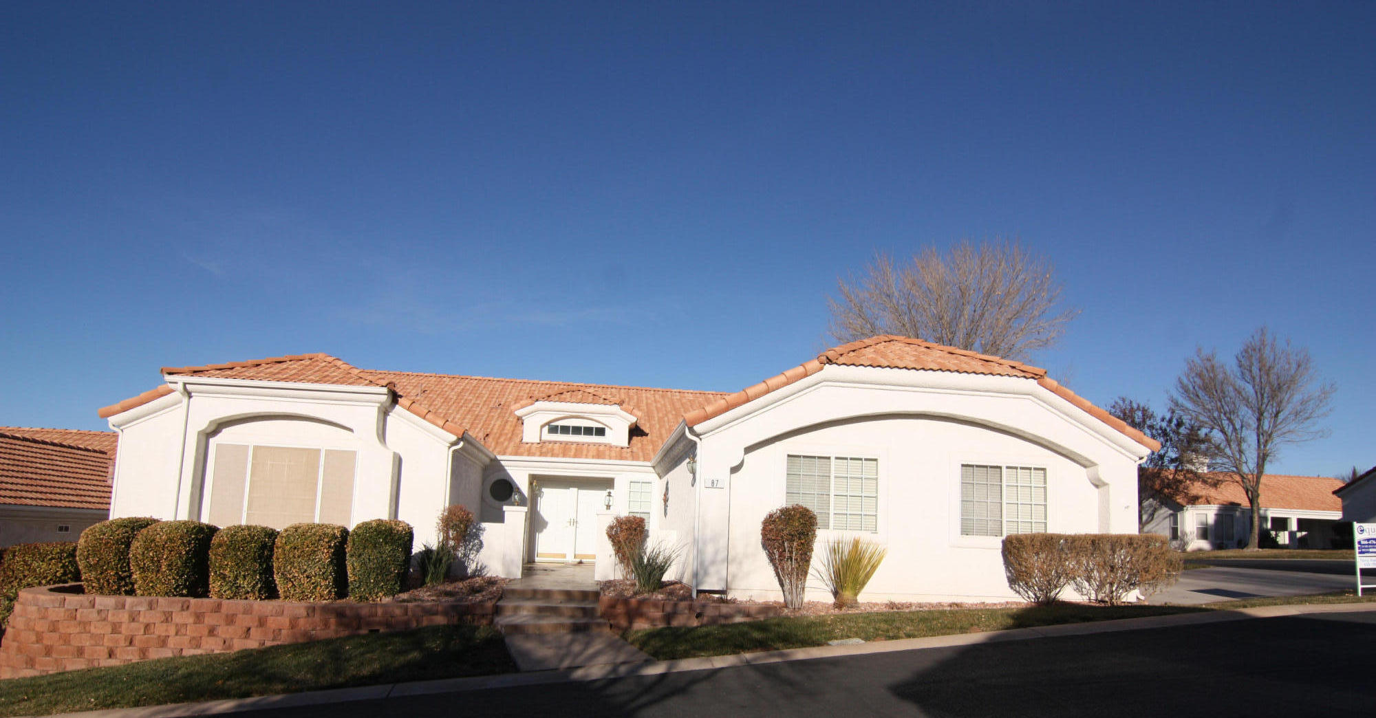 39 North Valley View Drive, Unit 87 St. George, UT 84770 - Photo 1 of 1 Nice entry, removable solar screens on windows, nicely landscaped.