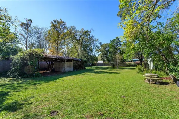 a view of a backyard with a garden