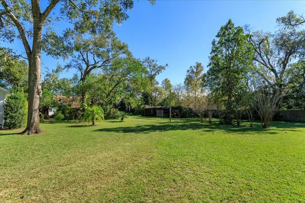 a view of a golf course with a lake