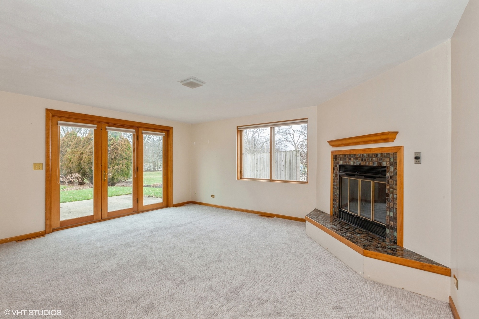 1330 South Main Street Wheaton, IL 60189 - Photo 14 of 19 a view of an empty room with a window and fire place