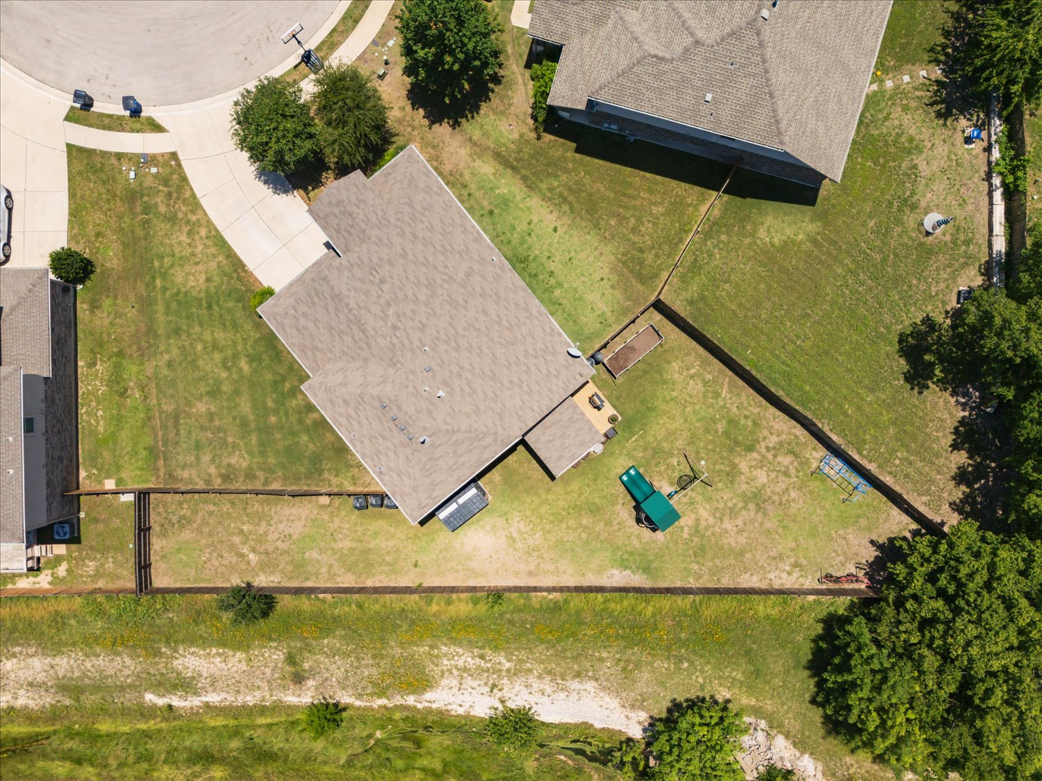 717 Kaluga Trail Leander, TX 78641 - Photo 35 of 40 an aerial view of a house with a swimming pool
