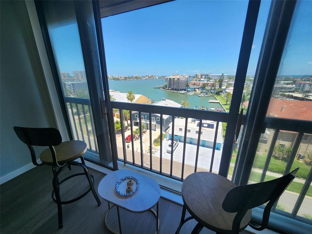 255 Dolphin Point, Unit 809 Clearwater, FL 33767 - Photo 11 of 16 a view of a room with furniture and lounge chair