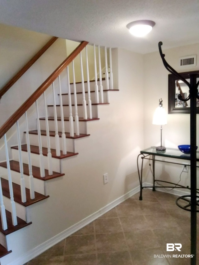 710 South Mobile Street, Unit 23 Fairhope, AL 36532 - Photo 6 of 42 Foyer to stairs