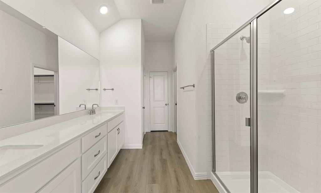 14200 Gallatin Street Pilot Point, TX 76258 - Photo 12 of 14 a spacious bathroom with a shower and a sink