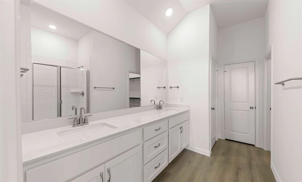 14200 Gallatin Street Pilot Point, TX 76258 - Photo 13 of 14 a spacious bathroom with double sink and a mirror