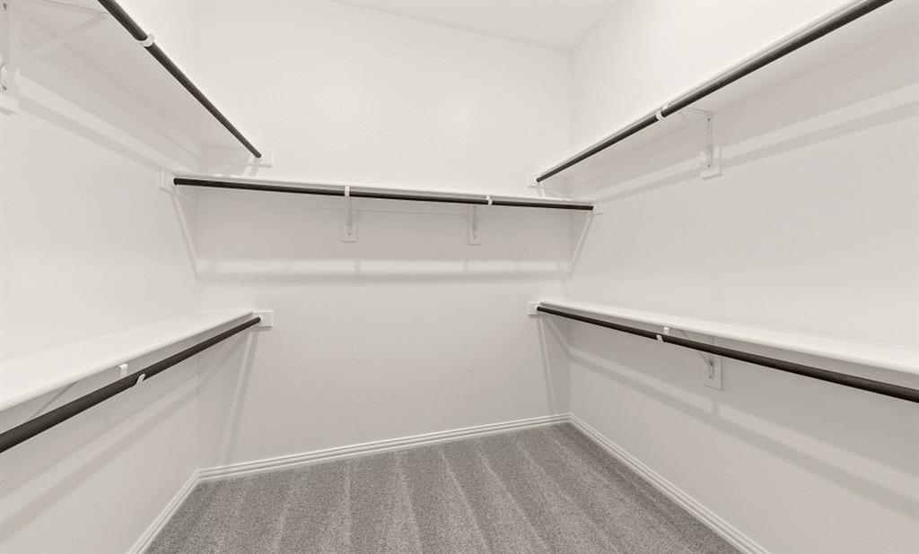 14200 Gallatin Street Pilot Point, TX 76258 - Photo 14 of 14 a view of an empty walk in closet
