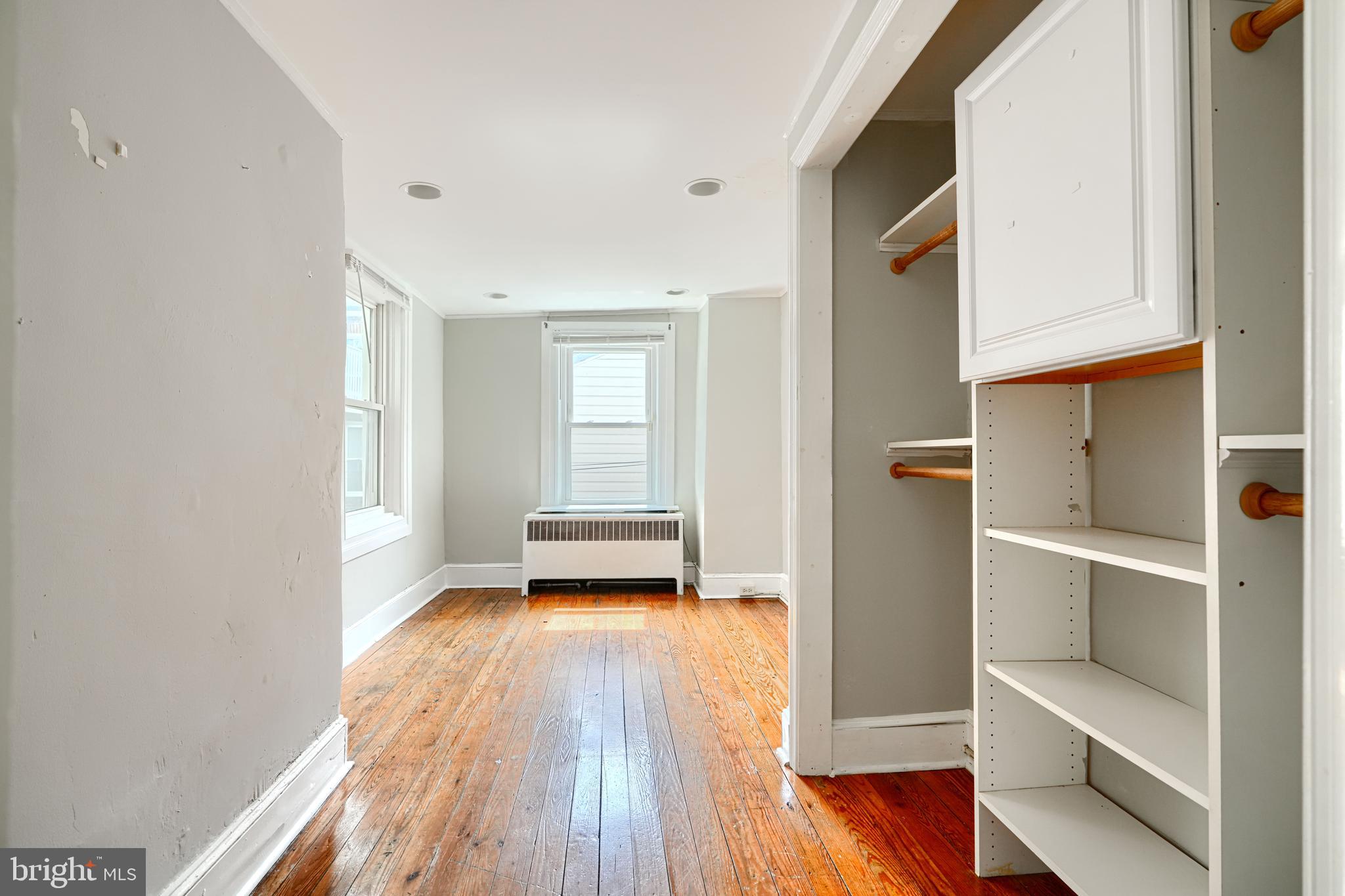 216 South High Street Baltimore, MD 21202 - Photo 15 of 25 a view of a room with wooden floor and a window