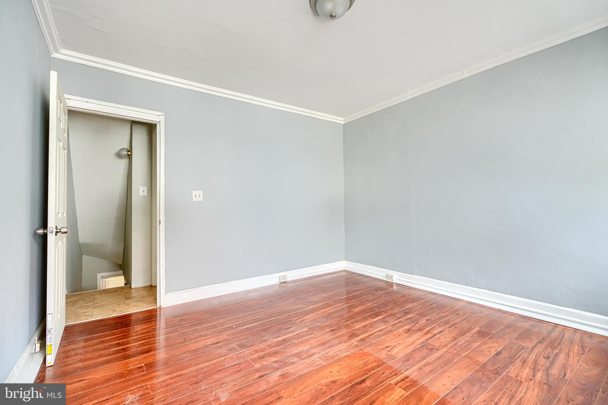 216 South High Street Baltimore, MD 21202 - Photo 20 of 25 a view of empty room with wooden floor